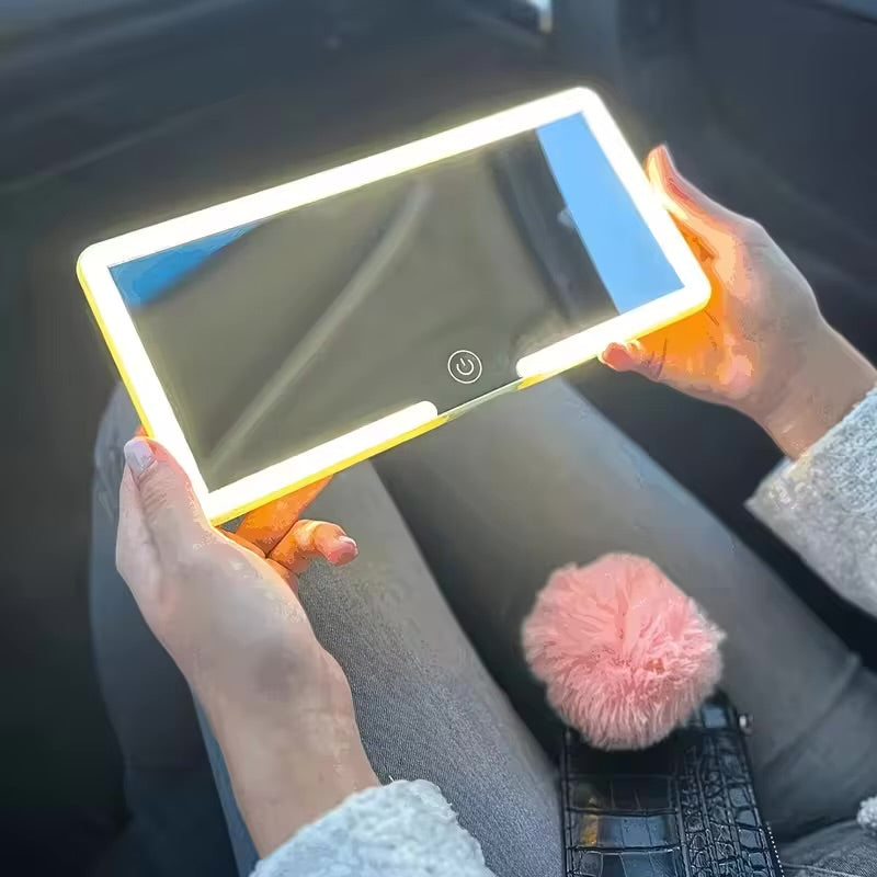 Espejo con luz para automóvil